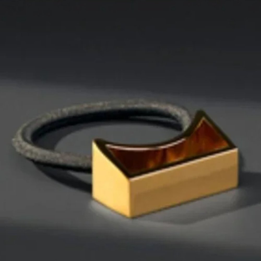 ORIBE GOLD PLATED METAL HAIR PONY
